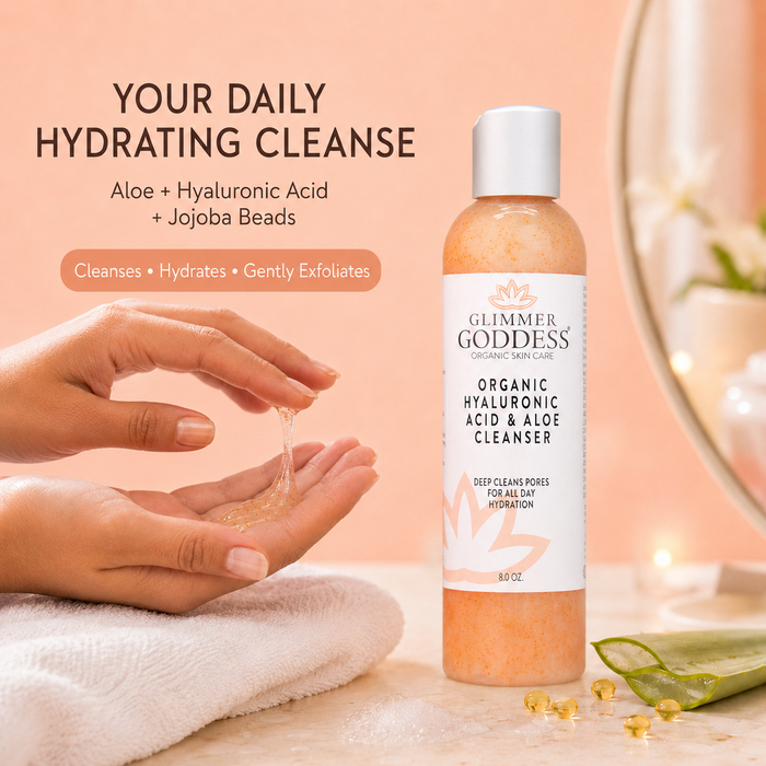 Organic hydrating facial cleanser with exfoliating jojoba beads from Glimmer Goddess® Organic Skin Care, featuring hyaluronic acid.
