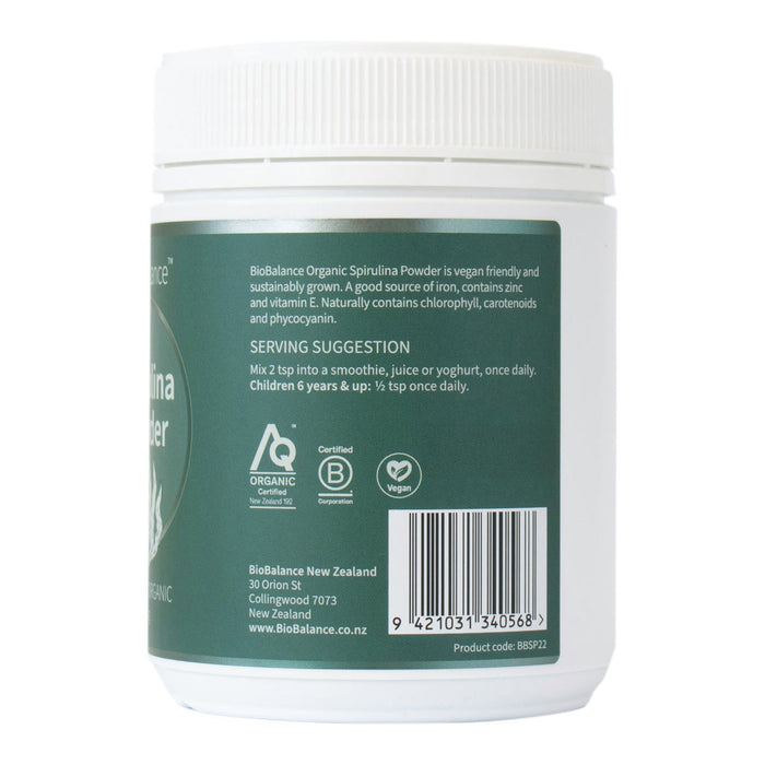 Back of a BioBalance Organic Spirulina container with text and labels.