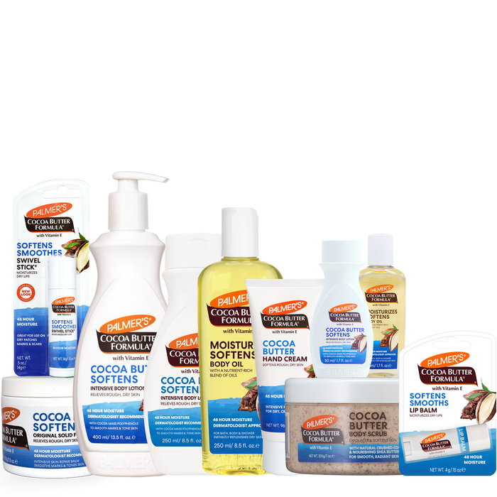 A collection of Palmie's Cocoa Butter Formula body care products, including hand cream, body lotion, hand cream, body oil, hand cream, lip balm, and a jar of cocoa butter body butter, arranged together on a plain white background.