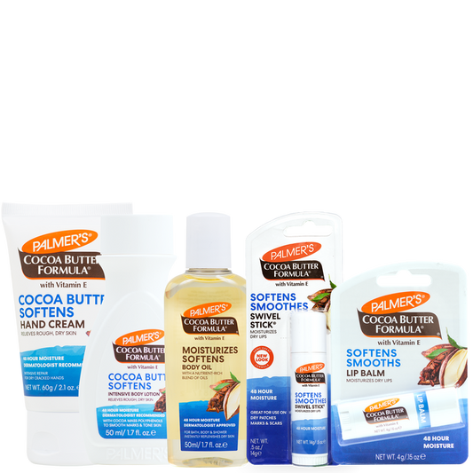 Four Palmer's Cocoa Butter Formula travel friendly skincare products arranged together on a white background: a hand cream tube, a body oil bottle, a swivel stick, and a lip balm pouch.