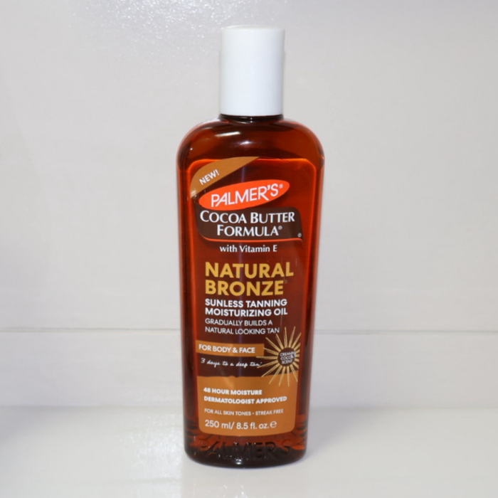 Palmer's Cocoa Butter Formula Natural Bronze oil bottle on a white background