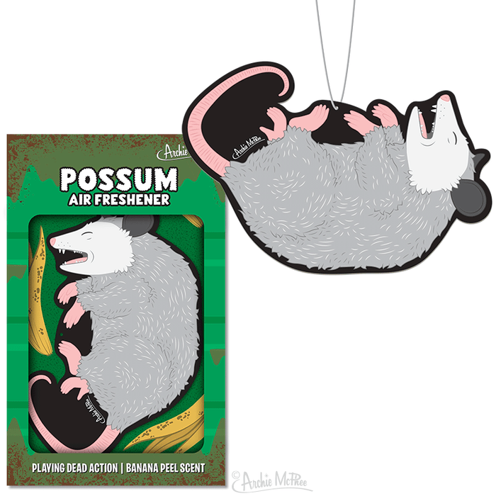 The Possum Air Freshener showcases a witty playing dead design, emitting a delightful banana aroma and is encased in playful banana peel packaging.