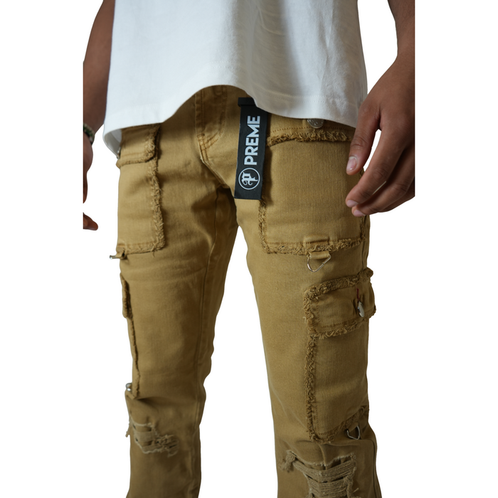 Close-up of the ripped and distressed details on the cargo pockets of PREME Khaki Ripped Cargo Denim Jeans (PR-WB-1285)