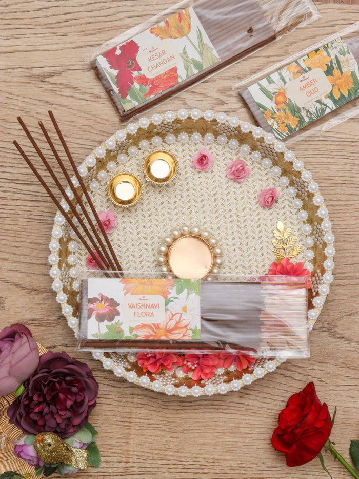 Floral incense sticks pack with Vaishnavi Flora label in decorative holder