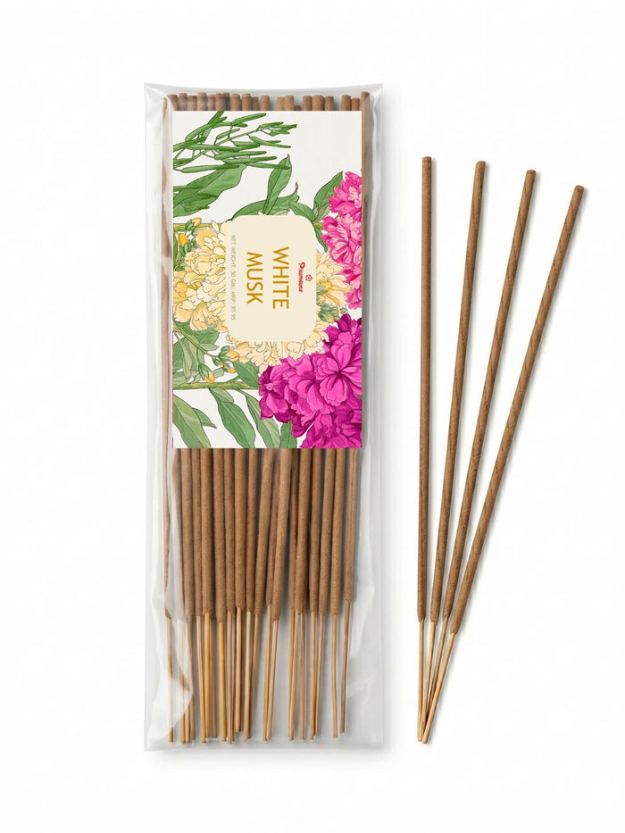 Agarbatti incense sticks in clear package with floral white-musk label and loose sticks