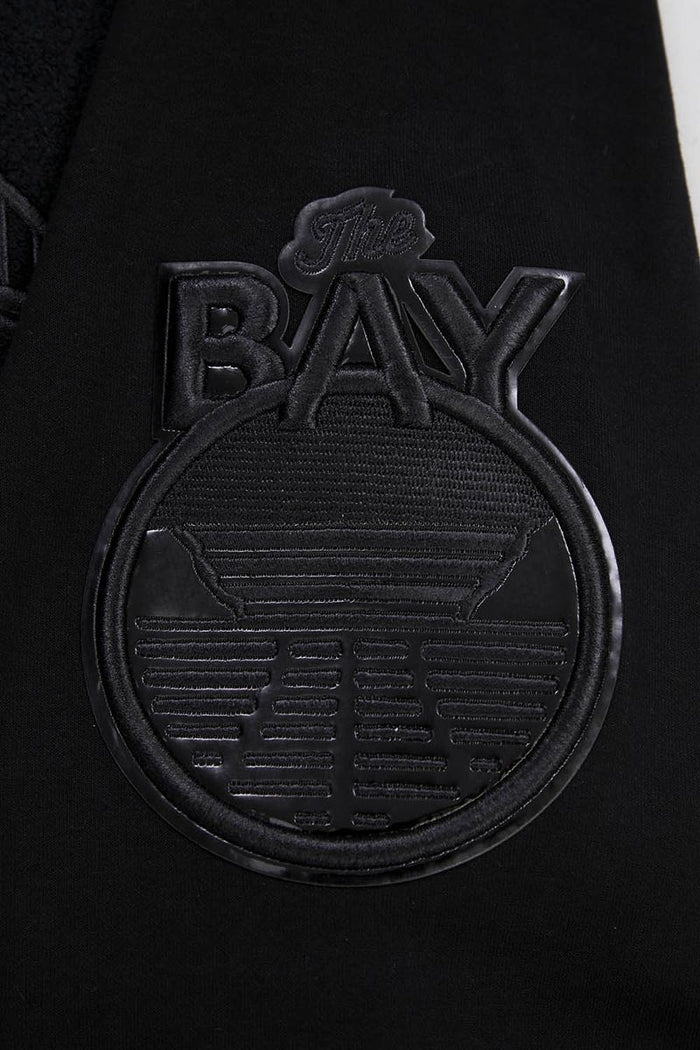 Black zip-up hoodie with Golden State Warriors branding, perfect for fans and casual wear