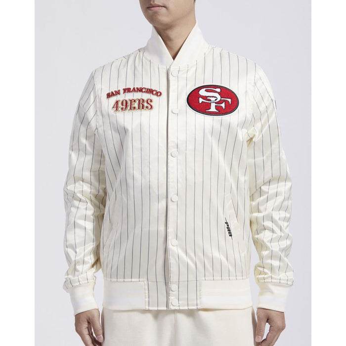 Pro Standard San Francisco 49ers Pinstripe Retro Satin Jacket in Eggshell and Grey color, featuring the team's logo and iconic pinstripe design