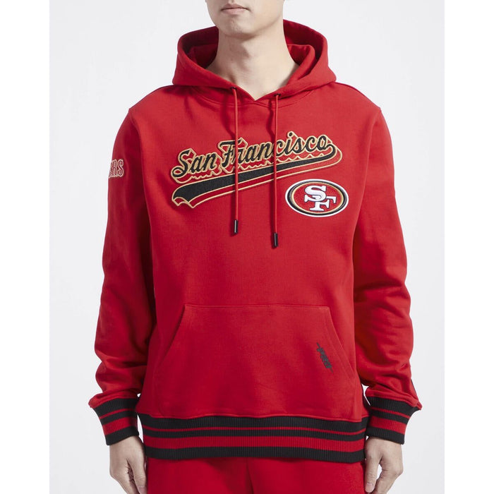 Red and black San Francisco 49ers Script Tail Rib FLC PO Hoodie, featuring team logo and script text across the front