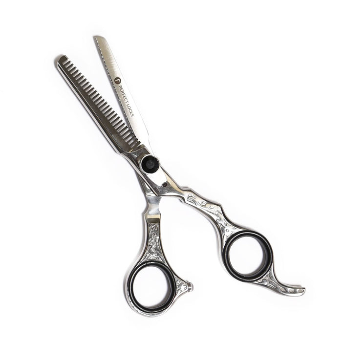 Decorative silver hair thinning shears with black finger grips, featuring one serrated blade and one straight blade for precise styling.