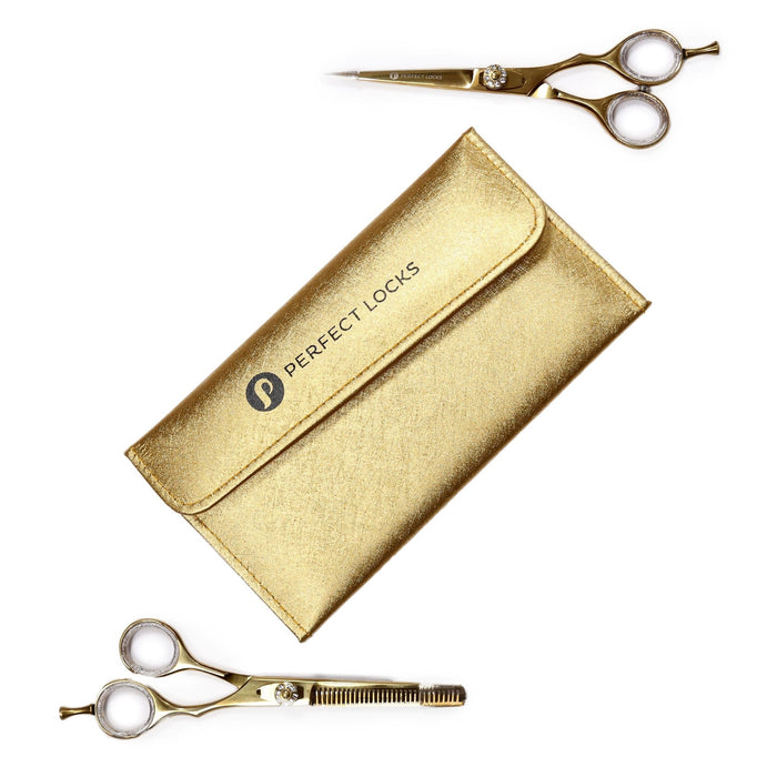 A pair of gold hair cutting scissors, thinning shears, and a matching gold case labeled Perfect Locks arranged on a white background.