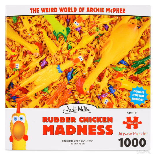 The Rubber Chicken Madness Puzzle is a 1000-piece set featuring quirky rubber chickens on the cover, offering an entertaining challenge.