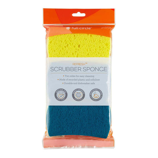 A packaged two-sided scrubber sponge by Full Circle, featuring a bright yellow sponge side and a teal blue scouring side, sealed in a clear plastic bag with an orange header.