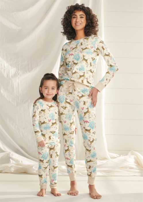 Family wearing Hatley Serene Forest pajamas for cozy matching sleepwear and lounging.