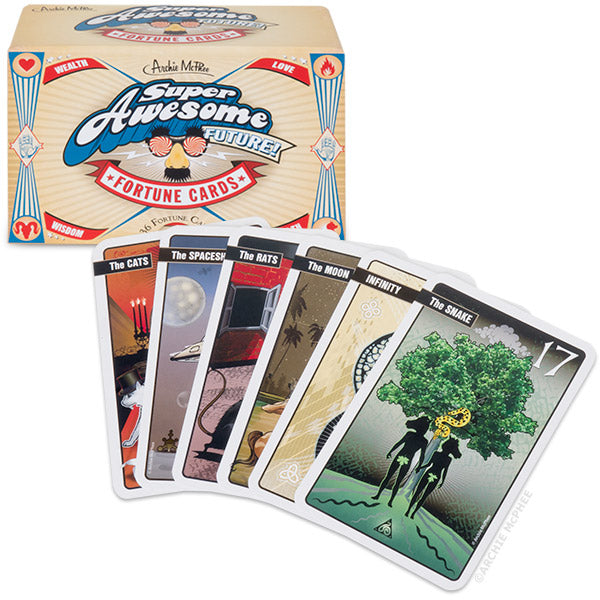 The *Super Awesome Future! Fortune Cards* offer a mesmerizing collection with themes such as cats, spaceships, and the moon, beautifully displayed in front of their box. Ideal for tarot card enthusiasts eager to explore divination.