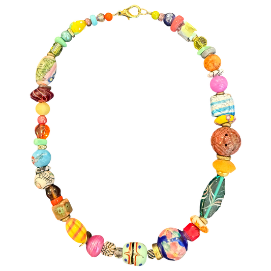 one of one necklace, colorful bead necklace, collected bead necklace, maximalist jewelry, artisan bead necklace, statement necklace, eclectic jewelry, porcelain bead necklace, glass bead necklace, resort jewelry, vacation accessories, wearable art necklace, chunky bead necklace, boutique jewelry, fashion jewelry, curated jewelry collection, boho luxury accessories, vintage inspired necklace, unique statement necklace, layered jewelry trend