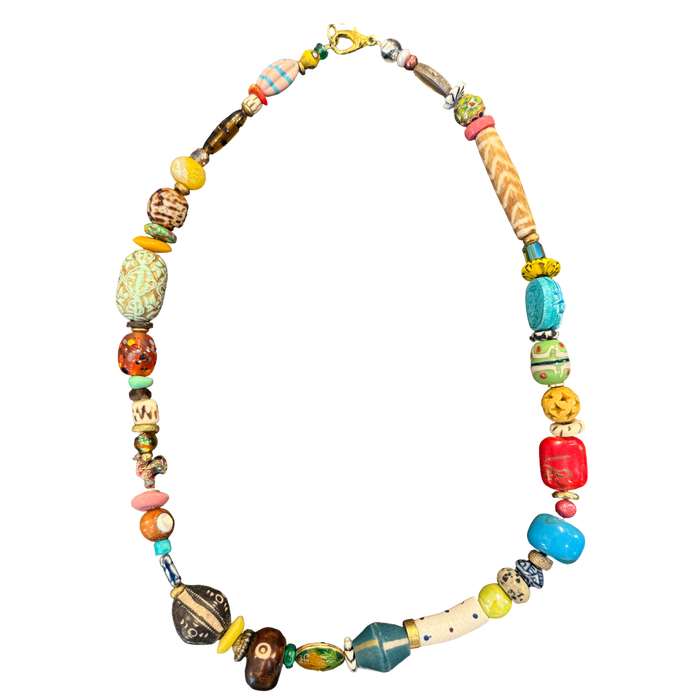 one of one necklace, collected bead necklace, artisan necklace, statement bead necklace, maximalist jewelry, wearable art necklace, eclectic jewelry, turquoise statement necklace, carved bead necklace, resort jewelry, boho luxury jewelry, chunky bead necklace, globally inspired jewelry, boutique jewelry, fashion jewelry, curated accessories, travel inspired necklace, colorful statement necklace, collector style jewelry, unique artisan necklace