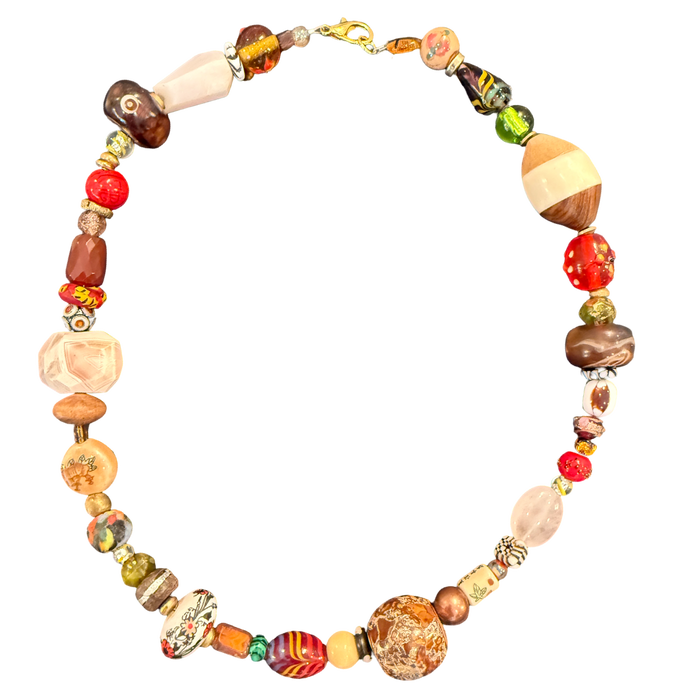 one of one necklace, collected bead necklace, artisan necklace, statement bead necklace, earthy jewelry, maximalist jewelry, wearable art necklace, eclectic jewelry, chunky bead necklace, resort jewelry, boho luxury jewelry, curated accessories, globally inspired jewelry, boutique jewelry, fashion jewelry, artistic statement necklace, vintage inspired jewelry, collector style jewelry, unique artisan necklace, earthy statement accessories