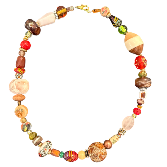 one of one necklace, collected bead necklace, artisan necklace, statement bead necklace, earthy jewelry, maximalist jewelry, wearable art necklace, eclectic jewelry, chunky bead necklace, resort jewelry, boho luxury jewelry, curated accessories, globally inspired jewelry, boutique jewelry, fashion jewelry, artistic statement necklace, vintage inspired jewelry, collector style jewelry, unique artisan necklace, earthy statement accessories
