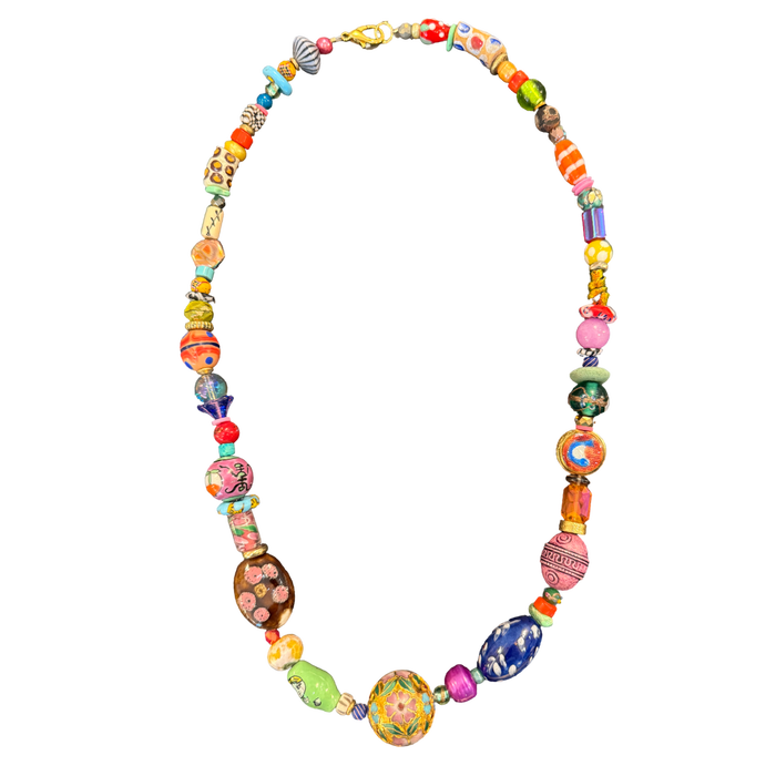 one of one necklace, colorful statement necklace, maximalist jewelry, collected bead necklace, artisan necklace, wearable art necklace, eclectic jewelry, dopamine dressing accessories, chunky bead necklace, resort jewelry, colorful artisan necklace, boutique jewelry, fashion jewelry, millefiori bead necklace, curated accessories, artistic statement necklace, boho luxury jewelry, collector style jewelry, vibrant statement accessories, unique artisan necklace