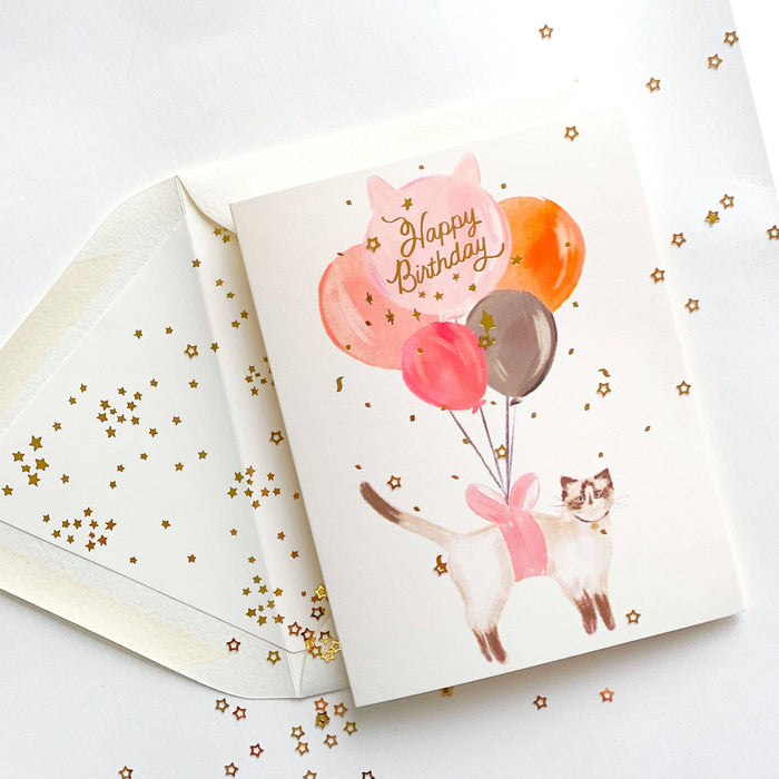 The First Snow - Happy Birthday Balloon Cat with Gold Confetti Greeting Card