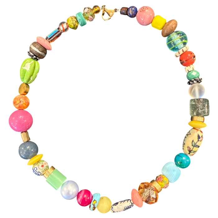 Colorful beaded necklace on a white background