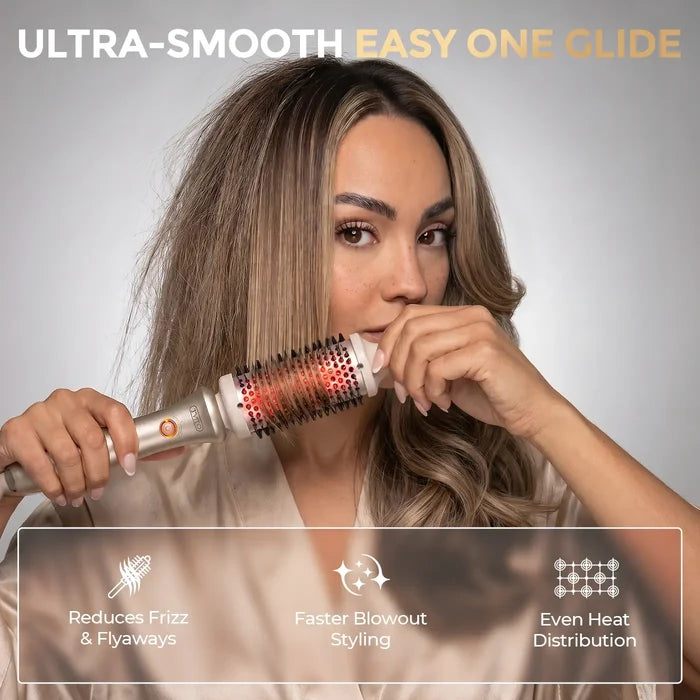 Female styling hair with TYMO infrared hot brush for smooth blowout